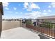 Outdoor balcony with metal railing and brick facade provides an ideal space for relaxing and enjoying scenic views at 9268 Wildfire Gorge St, Las Vegas, NV 89139