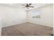 Bright and spacious bedroom with a ceiling fan offers a cozy retreat, illuminated by natural light from the window at 9268 Wildfire Gorge St, Las Vegas, NV 89139