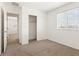 Bright bedroom with carpet, closet, window with blinds and neutral paint at 9268 Wildfire Gorge St, Las Vegas, NV 89139