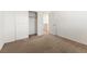 An empty bedroom offers an opportunity to create a personalized haven, complete with closet and natural light at 9268 Wildfire Gorge St, Las Vegas, NV 89139