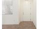 Bright entryway features neutral walls, tiled floor, and a white front door at 9268 Wildfire Gorge St, Las Vegas, NV 89139