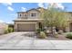 Charming two-story home with a two car garage and well-maintained front yard at 9268 Wildfire Gorge St, Las Vegas, NV 89139