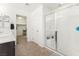 Modern main bathroom featuring a tiled shower with glass door and double sink vanity at 9268 Wildfire Gorge St, Las Vegas, NV 89139