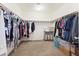 Spacious walk-in closet with ample shelving and storage space for clothes and accessories at 9268 Wildfire Gorge St, Las Vegas, NV 89139