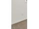 A freshly painted wall shows an electrical socket at the bottom at 9268 Wildfire Gorge St, Las Vegas, NV 89139