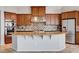 Kitchen with stainless steel appliances, custom cabinets, and granite counters at 9359 Brownstone Ledge Ave, Las Vegas, NV 89149