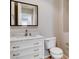 Powder room with a modern vanity and framed mirror at 9359 Brownstone Ledge Ave, Las Vegas, NV 89149
