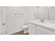 Bright bathroom featuring a white vanity, toilet, mirror, and modern fixtures at 965 Nevada State Dr # 6101, Henderson, NV 89002
