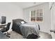 Neutral bedroom with plush carpet and a window providing natural light at 965 Nevada State Dr # 6101, Henderson, NV 89002