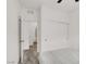 Neutral bedroom with plush carpet, sliding door closet, and open doorway to bathroom at 965 Nevada State Dr # 6101, Henderson, NV 89002