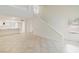 Spacious living room features tile floors, staircase, and kitchen access at , Las Vegas, NV 89117