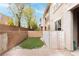 Backyard featuring a small turf area and brick pavers at 10091 Sand Key St, Las Vegas, NV 89178