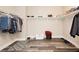 Well-organized walk-in closet providing ample storage space with shelving and hanging areas at 10091 Sand Key St, Las Vegas, NV 89178