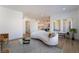 Bright living room featuring white walls, modern furniture, and ample natural light at 10809 Garden Mist Dr # 2072, Las Vegas, NV 89135