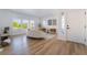 Bright and airy living room features large windows and a modern design aesthetic at 10809 Garden Mist Dr # 2072, Las Vegas, NV 89135