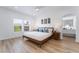 Spacious main bedroom with a ceiling fan, natural light, and modern ensuite bathroom at 10809 Garden Mist Dr # 2072, Las Vegas, NV 89135