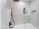 Contemporary shower featuring a black rainfall showerhead and handheld fixture at 10809 Garden Mist Dr # 2072, Las Vegas, NV 89135