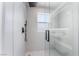 Elegant shower showcasing modern fixtures, glass doors, and sleek tile work at 10809 Garden Mist Dr # 2072, Las Vegas, NV 89135