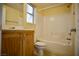 Bathroom featuring a tub and shower combo, a vanity with sink, and tile flooring at 1241 Gingerbread Man Ave, Las Vegas, NV 89183