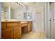 This bathroom has dual sinks, a tiled floor and walk-in shower at 1241 Gingerbread Man Ave, Las Vegas, NV 89183
