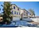 Charming two-story home with a well-manicured lawn and attached two car garage at 1241 Gingerbread Man Ave, Las Vegas, NV 89183