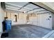 View of the garage showcasing ample space and built-in storage cabinets at 1241 Gingerbread Man Ave, Las Vegas, NV 89183