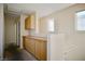 Hallway featuring custom built-in cabinetry, carpeted floors and neutral paint at 1241 Gingerbread Man Ave, Las Vegas, NV 89183