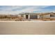 Charming single-story home with a two-car garage and low maintenance desert landscaping at 127 Crimson Cactus Ave, Henderson, NV 89011