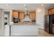 Spacious kitchen with granite countertops, stainless steel appliances, and an island for meal preparation at 127 Crimson Cactus Ave, Henderson, NV 89011