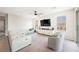 Spacious living room with large sectional sofa and access to the backyard at 127 Crimson Cactus Ave, Henderson, NV 89011
