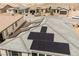 Top-down view of a home's roof featuring solar panels for energy efficiency at 127 Crimson Cactus Ave, Henderson, NV 89011