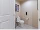 Simple and clean bathroom with a standard toilet and neutral decor at 135 E Harmon Ave # 2104, Las Vegas, NV 89109