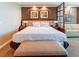 Luxurious bedroom with a king-size bed, elegant decor, and a partial view of the living area at 135 E Harmon Ave # 2104, Las Vegas, NV 89109