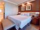 Well-lit bedroom featuring a king-size bed, side tables, and coordinated artwork at 135 E Harmon Ave # 2104, Las Vegas, NV 89109