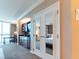 Modern kitchen view through French doors, featuring stainless steel appliances, granite countertop and breakfast nook at 135 E Harmon Ave # 2104, Las Vegas, NV 89109