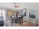 Dining room with table, chairs, and decorative mirrors at 1405 Bugle Boy Dr, Henderson, NV 89014