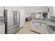 Modern kitchen with stainless steel appliances and a view to living space at 1405 Bugle Boy Dr, Henderson, NV 89014