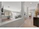 Bright living room with hard wood floors, modern furnishings, and lots of light at 1405 Bugle Boy Dr, Henderson, NV 89014