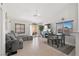 Cozy seating area next to dining room providing a comfortable and connected living space at 1405 Bugle Boy Dr, Henderson, NV 89014