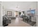 Cozy living space with comfortable seating and view from kitchen at 1405 Bugle Boy Dr, Henderson, NV 89014