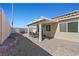 Spacious outdoor patio with a pergola, brick paving, and a built-in BBQ area at 1405 Bugle Boy Dr, Henderson, NV 89014