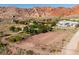 Picturesque homes surrounded by desert landscape with stunning views of the majestic Red Rock Mountains at 14525 Heyer Way, Las Vegas, NV 89161