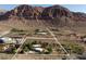 Beautiful aerial shot of property with mountain views, outlined to show boundaries and mature trees at 14525 Heyer Way, Las Vegas, NV 89161