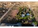 An aerial view of the property, highlighting the home and its lush surroundings in the desert landscape at 14525 Heyer Way, Las Vegas, NV 89161