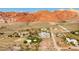Panoramic view of luxurious desert homes nestled against the stunning Red Rock Mountains at 14525 Heyer Way, Las Vegas, NV 89161