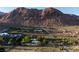 Aerial view of the desert property, showcasing mountain view and outlined to show boundaries at 14525 Heyer Way, Las Vegas, NV 89161