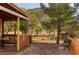 Charming backyard patio with colorful accents, featuring a cozy seating area and scenic views of the property at 14525 Heyer Way, Las Vegas, NV 89161