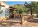 Inviting backyard patio with stone accents and a covered area, perfect for enjoying the outdoors at 14525 Heyer Way, Las Vegas, NV 89161