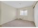 Empty bedroom with a large window and closet at 15 Richland Acres Ct, Henderson, NV 89074