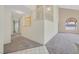 Bright foyer with a view of the staircase, tile, and carpet flooring at 15 Richland Acres Ct, Henderson, NV 89074